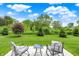 Backyard features a patio and plenty of trees at 6463 Wasco Dr, Whitestown, IN 46075
