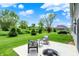 Backyard features a patio and plenty of green space at 6463 Wasco Dr, Whitestown, IN 46075