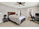 A primary bedroom has a ceiling fan, carpeting, a walk-in closet, and ensuite bathroom at 6463 Wasco Dr, Whitestown, IN 46075