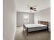 Bedroom with a ceiling fan and a window at 6463 Wasco Dr, Whitestown, IN 46075