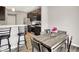 This spacious eat-in kitchen features a dining area, breakfast bar, and stainless appliances at 6463 Wasco Dr, Whitestown, IN 46075