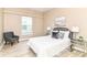 Comfortable bedroom with natural light, stylish furniture, and a relaxing ambiance for peaceful nights at 6471 Hunters Green Pl, Indianapolis, IN 46278
