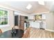 Modern kitchen featuring stainless steel appliances, white cabinetry, and ample counter space, great for cooking at 6471 Hunters Green Pl, Indianapolis, IN 46278