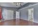 Spacious bedroom with hardwood floors and ensuite bathroom access at 6542 E Edna Mills Dr, Camby, IN 46113