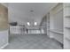 Bonus room with carpet flooring, built-in shelving and railing overlooking the lower level at 6542 E Edna Mills Dr, Camby, IN 46113