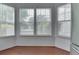 Bright breakfast nook with hardwood floors and large windows providing plenty of natural light at 6542 E Edna Mills Dr, Camby, IN 46113