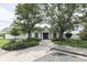 Charming community clubhouse framed by lush greenery and manicured landscaping at 6542 E Edna Mills Dr, Camby, IN 46113