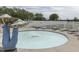 Shallow kiddie pool with a mushroom fountain and lounge chairs surrounding the area at 6542 E Edna Mills Dr, Camby, IN 46113