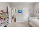 Inviting bedroom with a cozy seating area and ample storage space at 6609 Dunkirk Dr, McCordsville, IN 46055