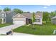 Beautiful single-Gathering home, landscaped lawn, a brick facade and an attached garage at 6609 Dunkirk Dr, McCordsville, IN 46055