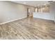 Bright and spacious living room showcasing beautiful hardwood floors and an open layout at 6847 Cardiff Dr, McCordsville, IN 46055