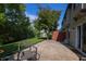Serene backyard with a patio and lush landscaping, offering a private outdoor retreat at 7155 Sea Pine Dr, Indianapolis, IN 46250