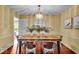 Well-lit dining area featuring hardwood floors and modern decor at 7316 Lesley Ave, Indianapolis, IN 46250