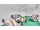 Inviting screened porch featuring comfortable seating and ample natural light at 7316 Lesley Ave, Indianapolis, IN 46250