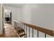 Hallway with wood floors and views of office room at 7334 Country Brook Dr, Indianapolis, IN 46260