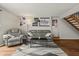 Relaxing living room with cozy seating, a stylish rug, and posters for a personalized space at 7334 Country Brook Dr, Indianapolis, IN 46260