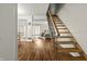 Inviting interior displaying staircase, hardwood floors, and living room with comfortable seating at 7334 Country Brook Dr, Indianapolis, IN 46260