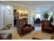 View of open living space with access to the kitchen and dining area at 7737 Wolfgang Pl, Indianapolis, IN 46239