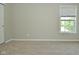 Neutral bedroom featuring plush carpeting, a window with blinds at 8354 Fieldfare Way, Indianapolis, IN 46237