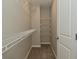 Walk-in closet featuring multiple shelves for optimal storage and organization at 8354 Fieldfare Way, Indianapolis, IN 46237