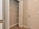 A closet features ample storage with wire shelving and a folding door at 8354 Fieldfare Way, Indianapolis, IN 46237