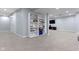 Finished basement featuring recessed lights, neutral carpet, a built-in bookshelf, and a TV viewing area at 8430 Harrison Pkwy, Fishers, IN 46038