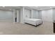 Finished basement with carpet, recessed lighting, built-in shelving, and a convenient Murphy bed at 8430 Harrison Pkwy, Fishers, IN 46038