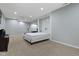 Finished basement featuring neutral carpet and a murphy bed with white shiplap paneling at 8430 Harrison Pkwy, Fishers, IN 46038