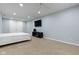 Finished basement featuring recessed lighting, neutral carpet, and a TV viewing area at 8430 Harrison Pkwy, Fishers, IN 46038