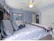 Comfortable bedroom with large bed, plush pillows, and soft natural light at 8430 Harrison Pkwy, Fishers, IN 46038
