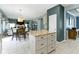 Kitchen island featuring granite countertops with storage space in an open concept kitchen at 8430 Harrison Pkwy, Fishers, IN 46038