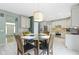 Open concept kitchen and dining area with stainless steel appliances and granite countertops at 8430 Harrison Pkwy, Fishers, IN 46038