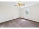 A bright bedroom featuring a ceiling fan and a window that lets in natural light at 903 W 22Nd St, Anderson, IN 46016
