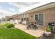 Charming patio with outdoor furniture and well maintained lawn at 9166 Lieven St, Avon, IN 46123