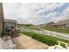 Scenic backyard view with patio, picket fence, and neighboring homes at 9166 Lieven St, Avon, IN 46123