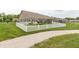 Backyard view featuring a walking path and white picket fence at 9166 Lieven St, Avon, IN 46123