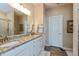 Bright bathroom with dual sinks, granite countertops, and stylish white cabinetry at 9166 Lieven St, Avon, IN 46123