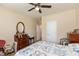 Comfortable bedroom featuring a ceiling fan and neutral wall paint at 9166 Lieven St, Avon, IN 46123