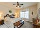 Cozy bedroom boasts a wooden bed frame and a large window at 9166 Lieven St, Avon, IN 46123