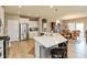 Stylish kitchen with stainless steel appliances, granite counters, and a breakfast bar island at 9166 Lieven St, Avon, IN 46123