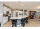 Modern kitchen with stainless steel appliances, granite countertops, and a breakfast bar at 9166 Lieven St, Avon, IN 46123