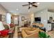Open-concept living room with hardwood flooring, comfortable sofas, and neutral tones at 9166 Lieven St, Avon, IN 46123