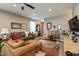 Bright and airy living room with hardwood floors, comfortable seating, and tasteful decorations at 9166 Lieven St, Avon, IN 46123