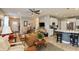 Spacious living room open to the kitchen area, featuring a breakfast bar with seating at 9166 Lieven St, Avon, IN 46123