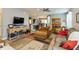 Cozy living room with open floor plan, hardwood floors, and comfortable seating arrangement at 9166 Lieven St, Avon, IN 46123