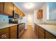 Well-lit kitchen with stainless steel appliances and ample counter space at 931 Wickham Ct # 101, Carmel, IN 46032