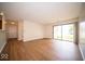 Inviting living room featuring wood floors and direct access to the outdoors at 931 Wickham Ct # 101, Carmel, IN 46032