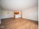 Open floor plan integrating living room, dining area, and a functional kitchen at 931 Wickham Ct # 101, Carmel, IN 46032