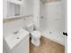 Bathroom showcasing tile flooring, toilet, and walk-in shower at 9490 E 36Th Pl, Indianapolis, IN 46235