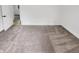 Bedroom showcasing plush carpeting, neutral decor, and bright natural light at 9490 E 36Th Pl, Indianapolis, IN 46235